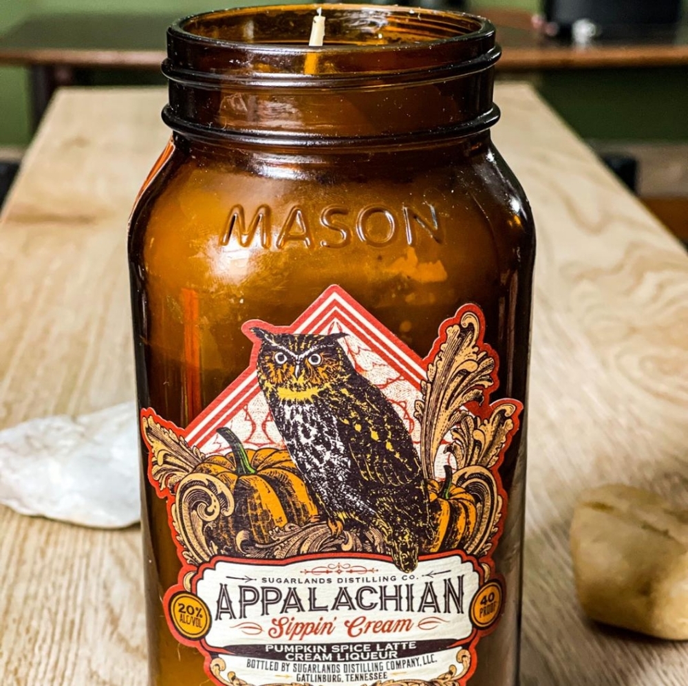 Vanilla scented candle with hint of witches brew